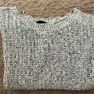 The perfect women’s black, white and grey sweater